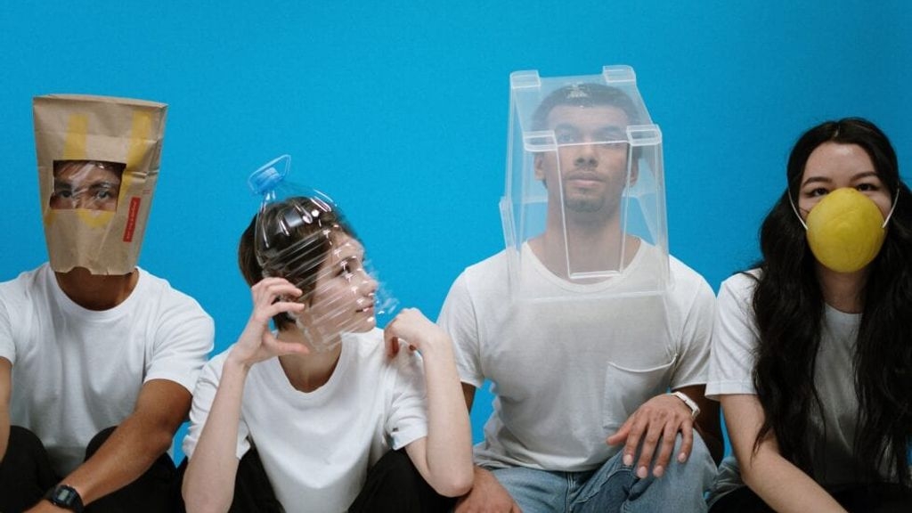 A group wearing strange mask attire