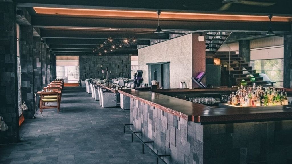 A view of an empty bar and dining area